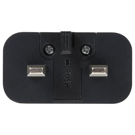 Essential Travel Adapter for Daily Device Charging - compact black UK-style two-pin plug adapter for charging phones and tablets