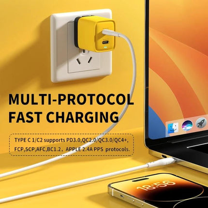 Reliable USB-C Charger for Daily Device Use at Home and On Trips shown plugged into wall charging a smartphone and laptop with dual USB-C ports