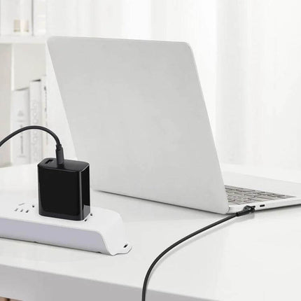 USB-C Laptop Charging Cable for 4.0mm Port, 1.5 Meters Long - black cable charging laptop on desk, ideal for travel and shared spaces
