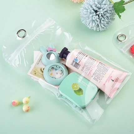 Transparent Self-Sealing Packaging Bags for Phone Cases, 100 Pack, 18x29cm - clear PVC pouch showing phone case accessories and cosmetics