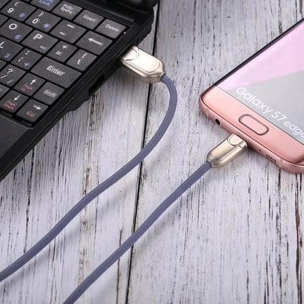 Essential Micro USB Cable for Daily Smartphone Charging - braided cable connecting Galaxy S7 Edge to laptop for charging and data transfer
