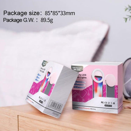 Versatile Clip-On Light for Daily Selfies and Social Media - compact clip-on LED light packaging on table, shows size and weight