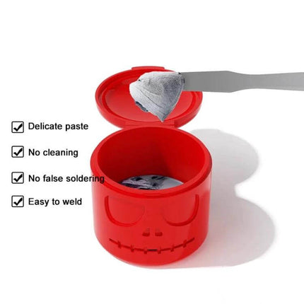 SNK Solder Paste For Electronics Repair, Low-Temp Tin Ointment shown in red skull container with spatula holding delicate paste for phone and PCB repairs