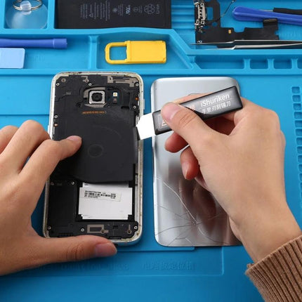 Qianli iShuriken Ultrathin Metal Scraping Tool for Electronics Repair being used to safely remove adhesive from a smartphone during disassembly