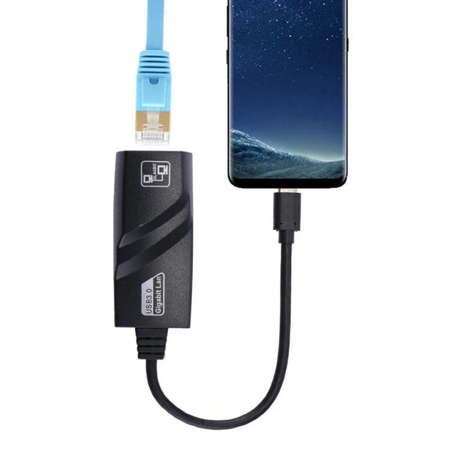 15cm USB-C to RJ45 Gigabit Ethernet Network Adapter connected to smartphone with blue Ethernet cable for stable wired internet