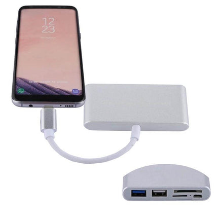 5-in-1 Multi-Port Card Reader Adapter for Smartphones and PCs connected to a smartphone via USB-C showing SD and USB ports