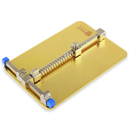 Stainless Steel Adjustable Holder for Mobile Phone PCB Repairs on gold workbench, adjustable clips and spring for secure phone positioning