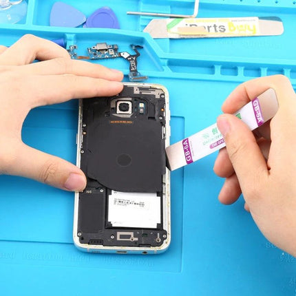 Comprehensive 16-in-1 Screwdriver and Repair Tool Set for Mobile Devices - hands using plastic pry tool to open smartphone for repair