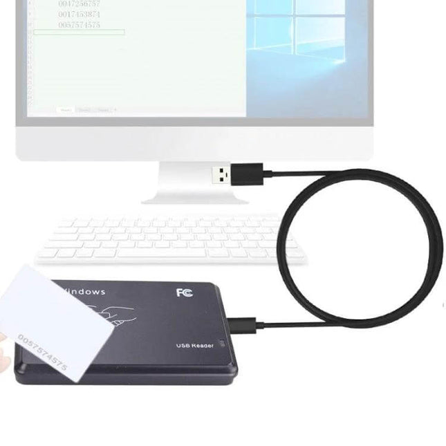 Portable USB Card Reader for IC and ID Access Control Systems shown connected to a PC for fast card verification
