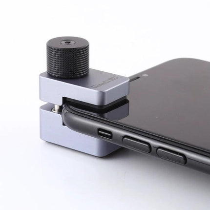 Qianli Universal Fix Clamp for Cell Phone and Tablet Repairs securing smartphone edge for precise screen and battery repair work