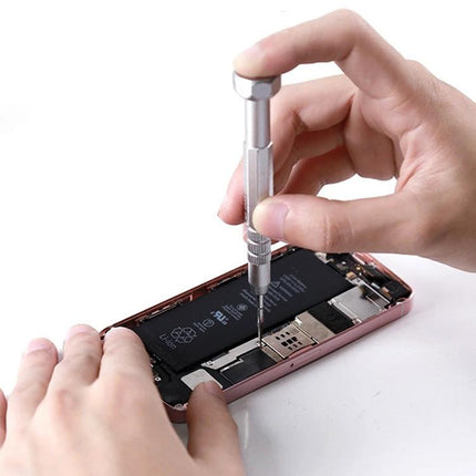 BEST 4-in-1 Screwdriver Set for Apple Phone Maintenance - hands using precision screwdriver to remove iPhone battery screws