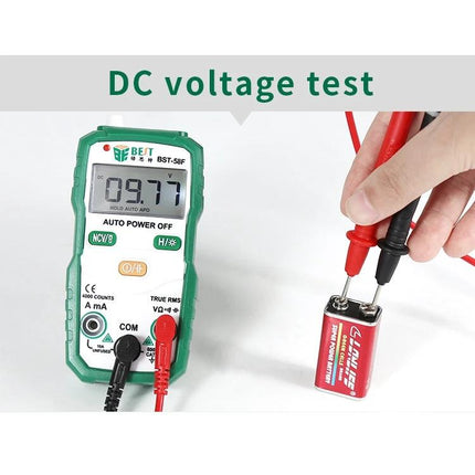 BEST Automatic Digital Multimeter for Household Electrical Testing measuring 9.77V DC on a 9V battery with red and black probes
