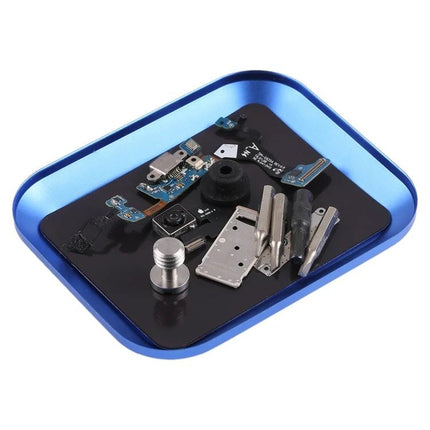 Red Magnetic Aluminum Alloy Screw Tray for Phone Repairs holding small phone parts and screws on a magnetic surface