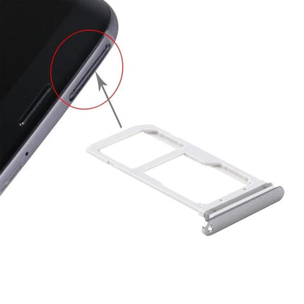 Replacement SIM and SD Card Tray for Samsung Galaxy S7 Use - silver replacement tray shown next to phone slot