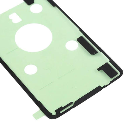 Adhesive for Repairing Samsung Galaxy S10+ Back Cover shown as green pre-cut adhesive gasket for phone back repair