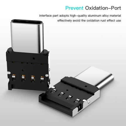 Compact USB-C Adapter for On-the-Go Phone Data Transfer - slim aluminum OTG adapter shown with USB drive connected for quick photo and file transfer