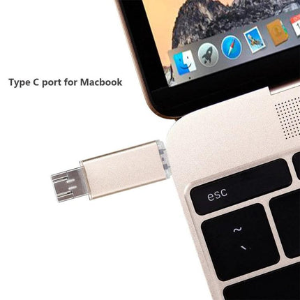 A Compact 32GB USB Drive for Daily File Transfers on Devices plugged into a MacBook Type C port showing plug-and-play functionality