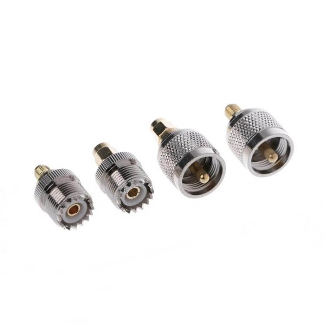 4-Piece RF Adapter Set for PL259 to SMA Connectors showing four brass-bodied PL259 to SMA adapters on white background