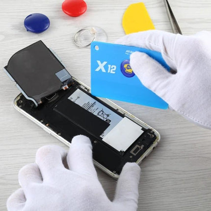 Mechanic Anti-Static Tool for Safe Phone Battery Removal — plastic pry card used with gloved hands to safely lift smartphone battery