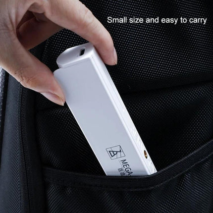 Green LED Dust Lamp for Detecting Phone Screen Dust and Cracks - compact white LED inspector being placed into a backpack pocket