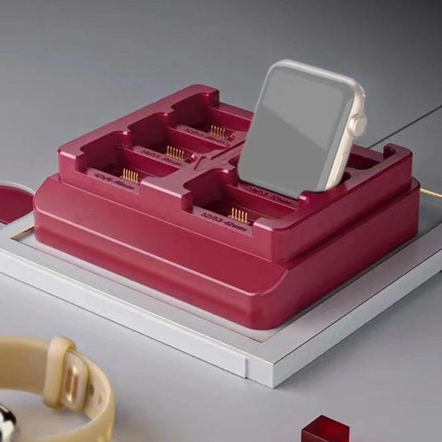 MagicAWRT iBus Recovery Adapter for Apple Watch Restoration showing red multi-slot adapter holding an Apple Watch for restoration