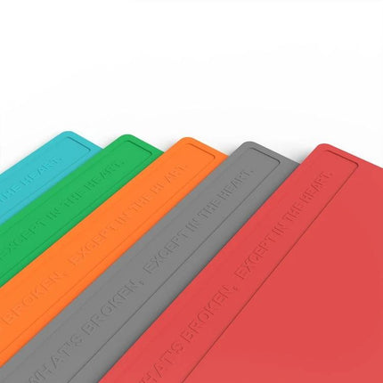 2UUL Heat-Resistant Silicone Pad for Workbench Use, 40x28cm in multiple colors shown protecting work surface from heat and soldering tools
