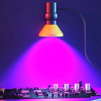 BOERUI USB UV Lamp for Curing Ink in Artistic Projects shining purple UV light onto circuit board for ink curing