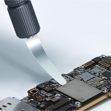 QIANLI 009 Plus Multi-Function Blade Set for Precision Repairs removing edge glue from a smartphone motherboard during precise disassembly