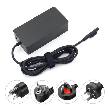 Microsoft Power Adapter for Surface Book Laptop Charging - black magnetic charger brick with coiled cable and multiple plug adapters
