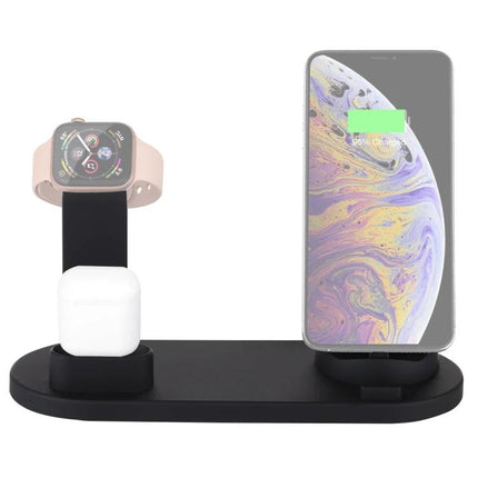 A Rotatable Charging Base for Everyday Home Device Needs showing phone upright, smartwatch and earbuds charging on sleek black stand