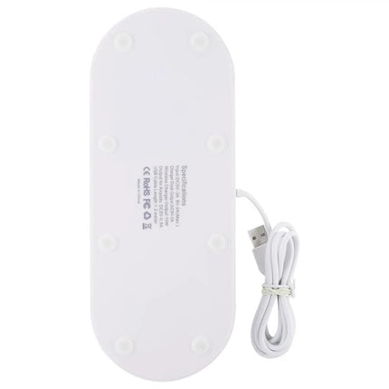 A Rotatable Charging Base for Everyday Home Device Needs - white underside view with USB cable coiled, non-slip feet and certification labels