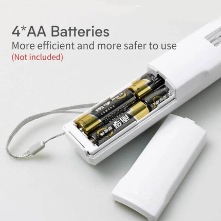 Portable Handheld UV Disinfection Lamp For Home And Travel showing open battery compartment with 4 AA batteries installed