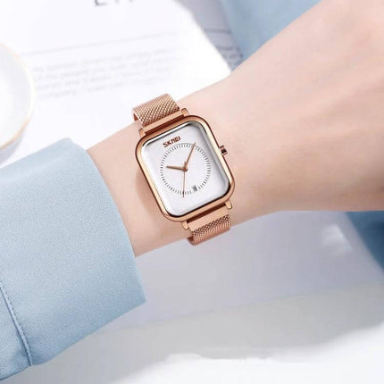 Skmei Men's Sports Quartz Watch with Magnetic Buckle on wrist, square white dial and rose gold mesh band, 30M waterproof sporty office style