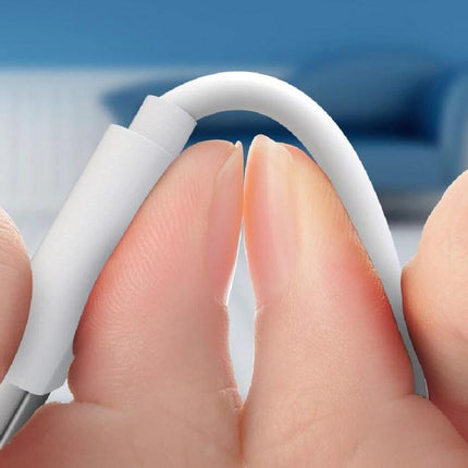 Compact Charger Set for Everyday Device Charging on the Go showing close-up of flexible white cable held between fingers, highlighting durability and portability