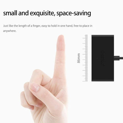 ORICO 4-Port USB 3.0 Hub for Connecting Multiple Devices showing compact size next to finger and 86mm ruler