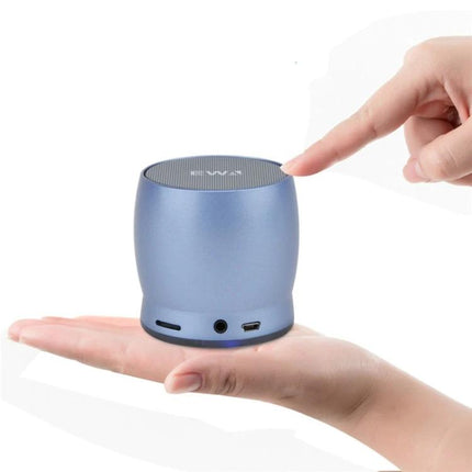 EWA Compact Bluetooth Speaker For Home And Commute shown in hand, pocketable 7x7x6.4cm speaker with 10hr battery