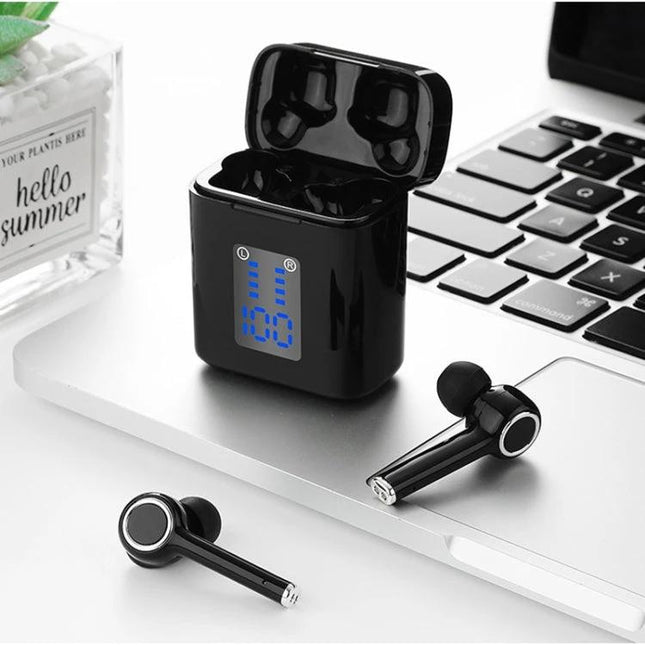 TG Wireless Earbuds With Charging Case And LED Display shown on laptop with open black charging case and earbuds