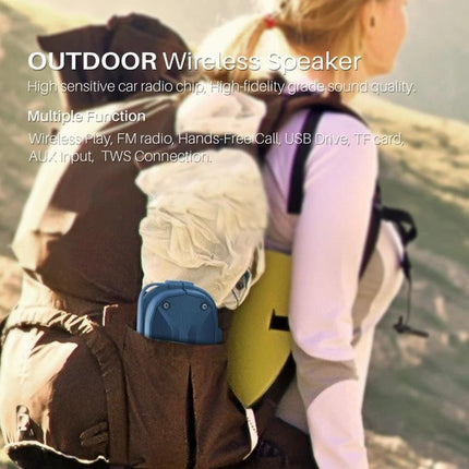NewRixing Portable Bluetooth Speaker For Home And Travel With Mic shown clipped to a hiker backpack, LED flashlight visible