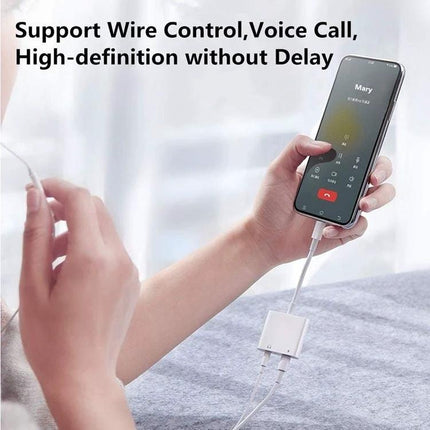 USB-C Adapter for Connecting Headphones to Smartphones Daily - white USB-C to 3.5mm adapter shown connecting wired headphones to smartphone during a call