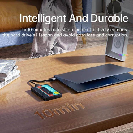 Orico 2.5 Inch USB 3.0 Hard Drive Enclosure for Data Storage showing tool-free cassette-style drive connected to laptop on wooden desk