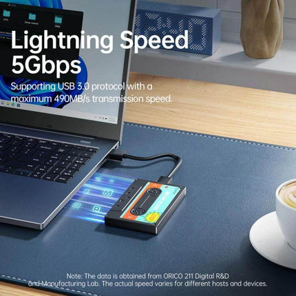 Orico 2.5 Inch USB 3.0 Hard Drive Enclosure for Data Storage shown connected to laptop for fast 5Gbps transfers