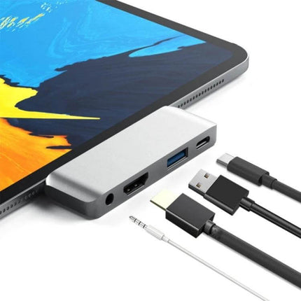 Versatile 4-in-1 USB-C Hub for Video and Presentations connected to tablet with HDMI, USB, USB-C and audio ports for mobile presentations