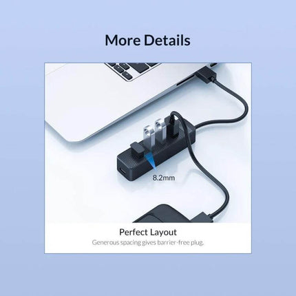 Orico Black 7-Port USB Hub for Connecting Multiple Devices Daily — compact black hub beside laptop managing multiple USB-A cables