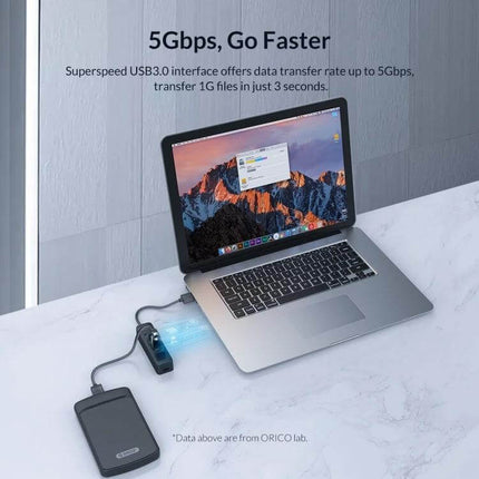 Orico Black 7-Port USB Hub for Connecting Multiple Devices Daily shown connected to a laptop and external drive demonstrating fast USB-A 3.0 data transfer
