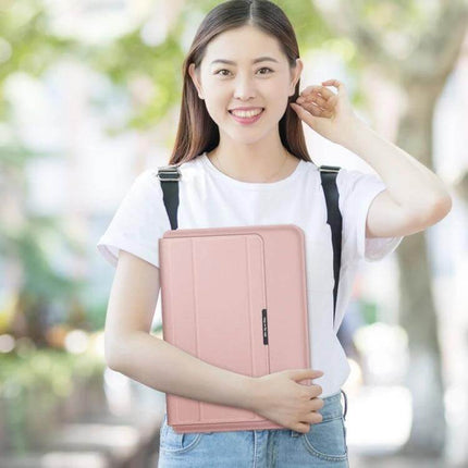 Waterproof PU Leather Universal Laptop Holder Bag for Travel, pink sleeve with built-in stand held by smiling student commuting
