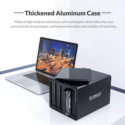 Orico 2-Bay USB Hard Drive Enclosure for Secure Data Storage black aluminum 3.5-inch dual-bay external HDD enclosure next to laptop