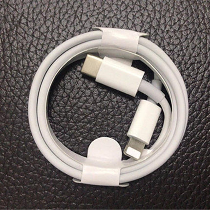 Travel Charger Set for On-the-Go Device Charging Needs white PD 20W 8-pin cable coiled on black textured background