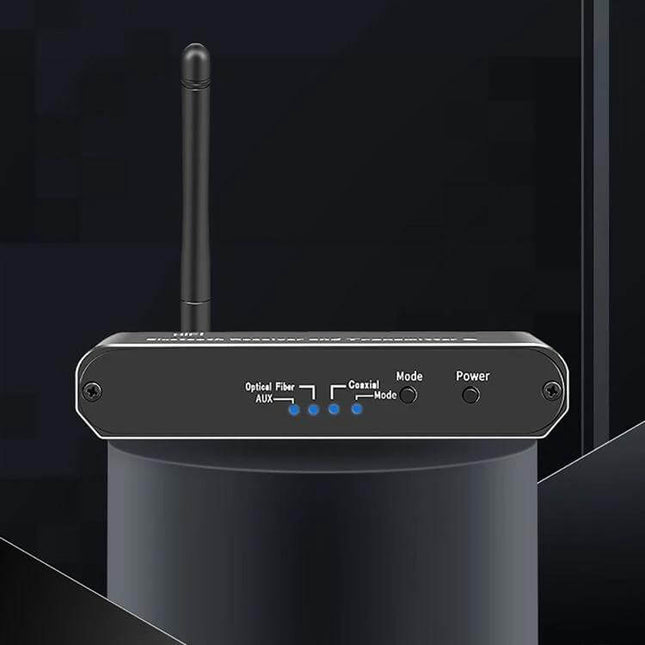3-in-1 Bluetooth Receiver, Transmitter, and Digital to Analog Converter black unit with antenna showing optical, coaxial, AUX ports and mode LEDs