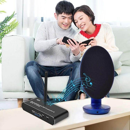 3-in-1 Bluetooth Receiver, Transmitter, and Digital to Analog Converter shown streaming phone audio to vintage speaker in living room