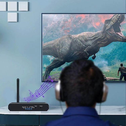 3-in-1 Bluetooth Receiver, Transmitter, and Digital to Analog Converter connected to TV and headphones for wireless audio playback